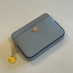 Michael Kors brand new zippered coin purse. Baby blue, excellent condition.